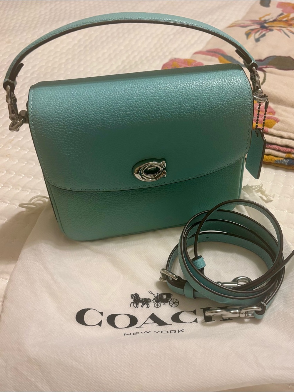 EUC Coach Pebbled Cassie Leather Turnlock Crossbody Bag in Faded Blue